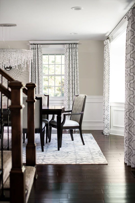 Modern Dining Room with Custom Drapery Panels and Luxurious Crystal Accents