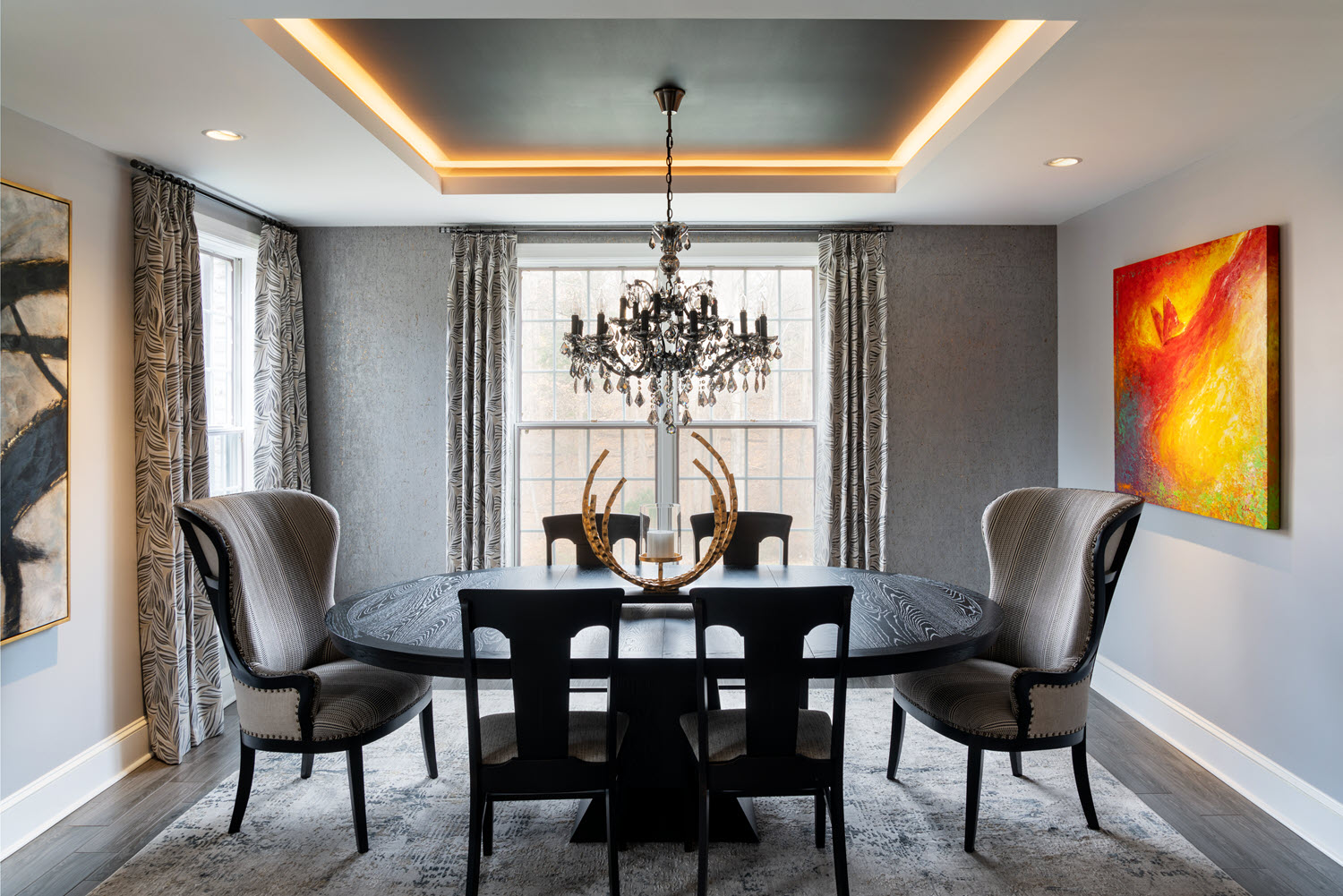 Contemporary Dining Room with Black and Gold Accents