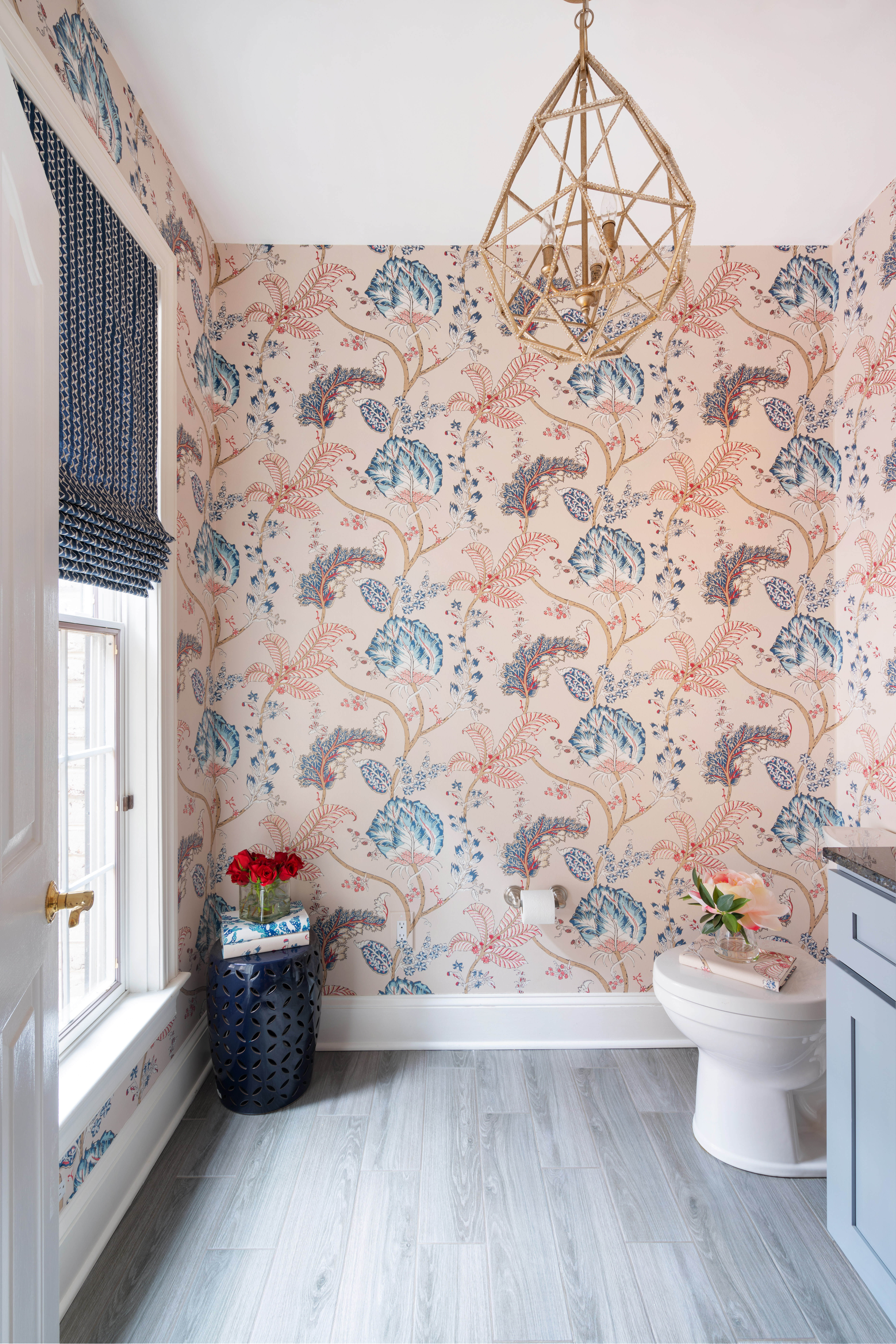 Updated Powder Room with Floral Wallpaper, Custom Navy Drapery and Crystal Light Fixture