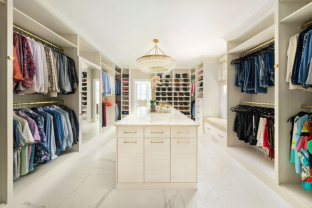 Nothing says luxury more than a custom closet with window seat and island storage.